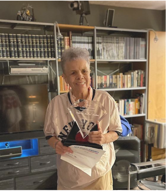 Mickey Medina receiving Phil Davis Award in 2025